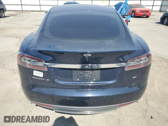 2014 Tesla Model S 60 с VIN 5YJSA1S13EFP29202, выставлен на аукционе Copart как лот 59046255 с пробегом Не указан миль и Списание • Salvage title. История ставок и продаж доступна на DreamBid. Изображение 6.