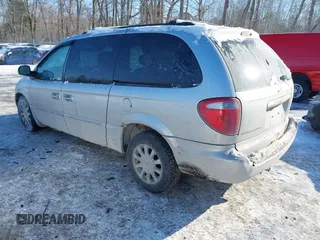2001 Chrysler Town & Country with VIN 2C4GT54LX1R339931, listed as a IAAI auction lot 41374850 with 135,612 mi miles and . Bid and sale history available at DreamBid. Image 3.