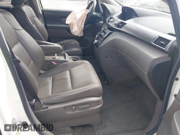 2012 Honda Odyssey EX-L with VIN 5FNRL5H62CB059481, listed as a IAAI auction lot 42241415 with 135,244 mi miles and . Bid and sale history available at DreamBid. Image 5.