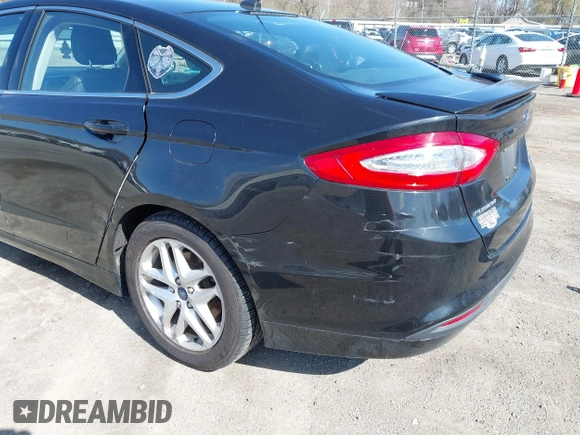 2014 Ford Fusion SE with VIN 1FA6P0HDXE5370384, listed as a IAAI auction lot 41973412 with 147,459 mi miles and . Bid and sale history available at DreamBid. Image 6.