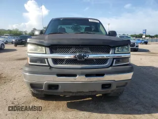 2005 Chevrolet Silverado 1500 LS z VIN 1GCEK19V45E151261, wystawiony jako Copart lot #61556275 z przebiegiem 329 943 mil mil oraz Czysty tytuł • Clean title. Historia ofert i sprzedaży dostępna na DreamBid. Obrazek 5.