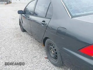 2003 Mitsubishi Lancer ES with VIN JA3AJ26E83U015342, listed as a IAAI auction lot 41819617 with 355,658 mi miles. Bid and sale history available at carsss.com. Image 13.