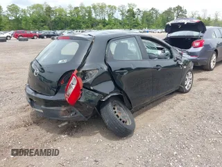 2011 Mazda 2 Touring z VIN JM1DE1HZ9B0101794, wystawiony jako IAAI lot #42318743 z przebiegiem 137 224 mil mil oraz . Historia ofert i sprzedaży dostępna na DreamBid. Obrazek 4.