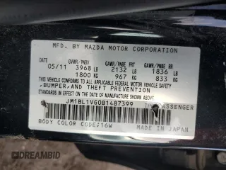 2011 Mazda 3 i Touring z VIN JM1BL1VG0B1487399, wystawiony jako Copart lot #57860375 z przebiegiem 177 755 mil mil oraz Szkoda całkowita • Salvage title. Historia ofert i sprzedaży dostępna na DreamBid. Obrazek 12.