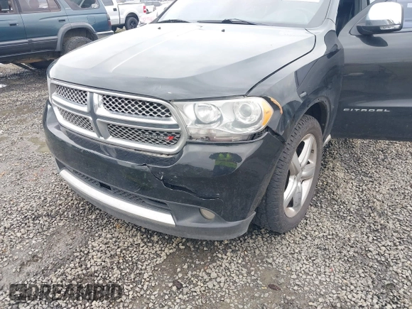 2013 Dodge Durango Citadel with VIN 1C4SDHET9DC510172, listed as a IAAI auction lot 41829385 with 133,710 mi miles and . Bid and sale history available at carsss.com. Image 6.