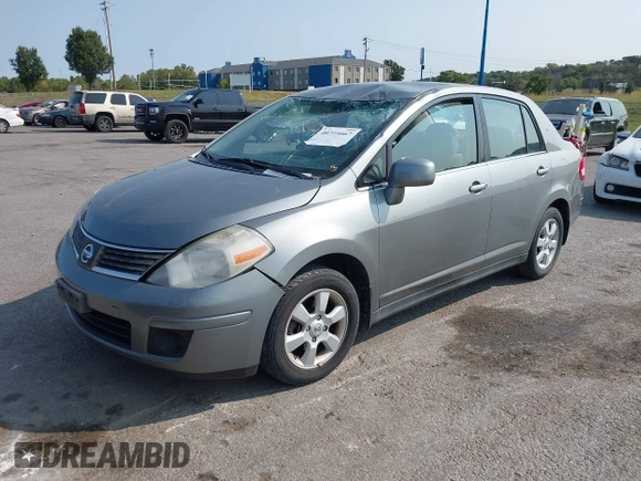 2007 Nissan Versa SL with VIN 3N1BC11E47L404371, listed as a IAAI auction lot 40309667 with 131,954 mi miles and . Bid and sale history available at DreamBid. Image 2.