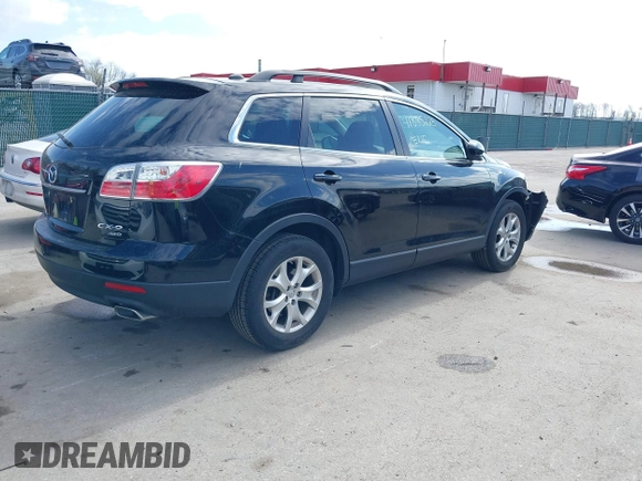 2012 Mazda CX-9 Touring z VIN JM3TB3CV6C0369022, wystawiony jako IAAI lot #41895225 z przebiegiem 137 883 mil mil oraz . Historia ofert i sprzedaży dostępna na DreamBid. Obrazek 4.