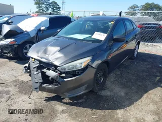 2017 Ford Focus S z VIN 1FADP3E29HL269607, wystawiony jako IAAI lot #41654836 z przebiegiem 101 645 mil mil oraz . Historia ofert i sprzedaży dostępna na DreamBid. Obrazek 17.