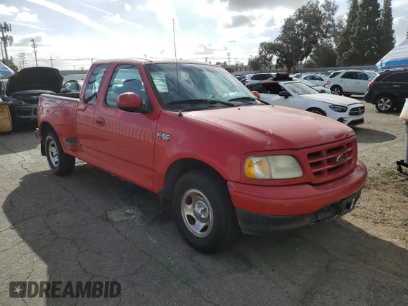 2003 Ford F-150 XL with VIN 1FTRX07213KB93777, listed as a Copart auction lot 46950285 with 176,332 mi miles and Salvage title. Bid and sale history available at DreamBid. Image 4.