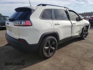 2019 Jeep Cherokee Latitude Plus with VIN 1C4PJMLB7KD362967, listed as a Copart auction lot 52439845 with 59,751 mi miles and Salvage title. Bid and sale history available at DreamBid. Image 3.