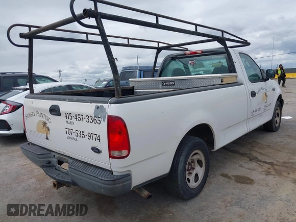2002 Ford F-150 XL with VIN 1FTRF172X2KE34789, listed as a IAAI auction lot 42138397 with 188,960 mi miles and . Bid and sale history available at DreamBid. Image 4.