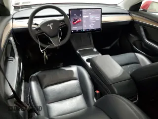 2022 Tesla Model 3 with VIN 5YJ3E1EA7NF372515, listed as a Copart auction lot 52853925 with 56,679 mi miles and Clean Title. Bid and sale history available at carsss.com. Image 8.