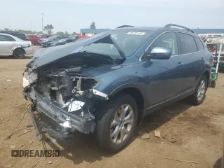 2014 Mazda CX-9 Touring with VIN JM3TB3CAXE0437077, listed as a Copart auction lot 60470145 with 60,572 mi miles and Salvage title. Bid and sale history available at DreamBid. Image 1.