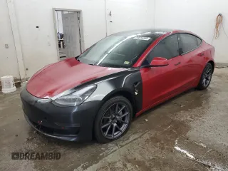 2021 Tesla Model 3 Standard Range Plus z VIN 5YJ3E1EA9MF059769, wystawiony jako Copart lot #54014345 z przebiegiem 21 654 mil mil oraz Szkody całkowita. Historia ofert i sprzedaży dostępna na DreamBid. Obrazek 1.