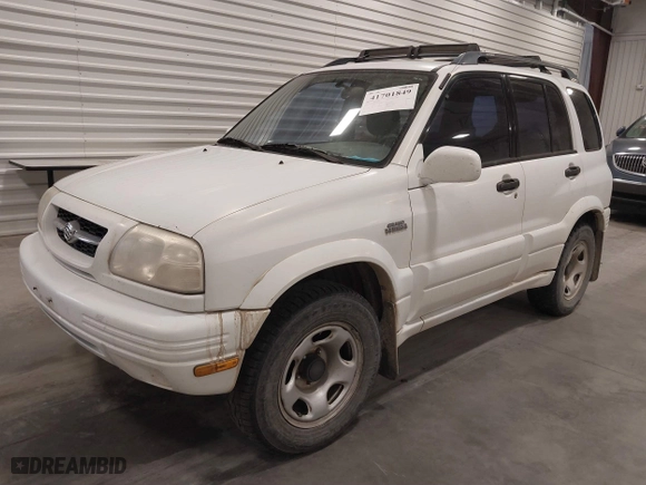 2000 Suzuki Grand Vitara JLX with VIN JS3TD62VXY4130242, listed as a IAAI auction lot 41701849 with 106,700 mi miles. Bid and sale history available at carsss.com. Image 2.
