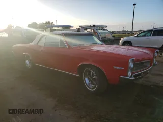 1966 Pontiac GTO z VIN 235676P261739, wystawiony jako Copart lot #75633424 z przebiegiem 23 103 mil mil oraz Szkoda całkowita • Salvage title. Historia ofert i sprzedaży dostępna na DreamBid. Obrazek 4.