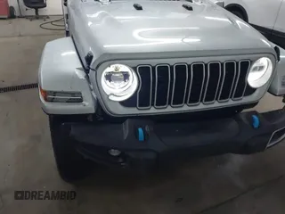 2024 Jeep Wrangler Sahara with VIN 1C4RJXP63RW202929, listed as a IAAI auction lot 41002346 with 12,332 mi miles and . Bid and sale history available at DreamBid. Image 6.