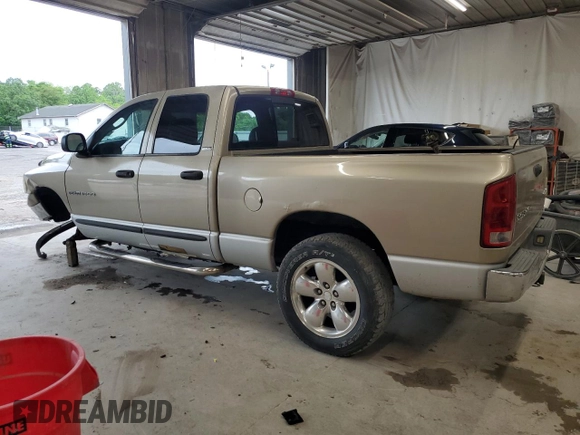 2002 Dodge 1500 with VIN 1D7HU18N82S706899, listed as a Copart auction lot 57672685 with 148,657 mi miles and Salvage title. Bid and sale history available at DreamBid. Image 2.