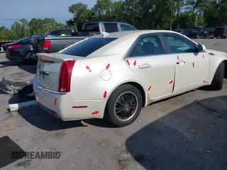 2009 Cadillac CTS RWD z VIN 1G6DF577190106800, wystawiony jako IAAI lot #42316470 z przebiegiem 147 836 mil mil oraz . Historia ofert i sprzedaży dostępna na DreamBid. Obrazek 4.