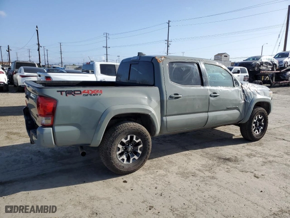 2023 Toyota Tacoma 4WD SR with VIN 3TMCZ5AN5PM538629, listed as a Copart auction lot 51848135 with 30,672 mi miles and Salvage Title. Bid and sale history available at carsss.com. Image 3.