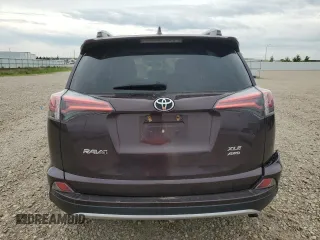 2016 Toyota RAV4 XLE with VIN 2T3RFREV0GW517044, listed as a Copart auction lot 59749195 with 81,834 mi miles and Salvage title. Bid and sale history available at DreamBid. Image 6.