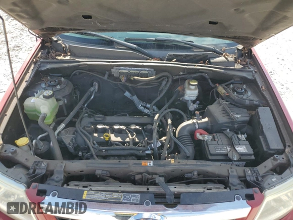 2011 Mazda Tribute Touring with VIN 4F2CY0C7XBKM00671, listed as a Copart auction lot 75431144 with 140,748 mi miles and Clean Title. Bid and sale history available at carsss.com. Image 12.