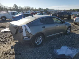 2012 Kia Optima LX z VIN 5XXGM4A7XCG077323, wystawiony jako Copart lot #50527465 z przebiegiem 194 243 mil mil oraz Szkoda całkowita • Salvage title. Historia ofert i sprzedaży dostępna na DreamBid. Obrazek 3.