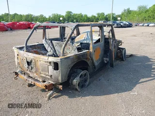 2015 Jeep Wrangler Unlimited Sport with VIN 1C4BJWDG8FL736241, listed as a IAAI auction lot 42395839 with Not provided miles and . Bid and sale history available at DreamBid. Image 4.