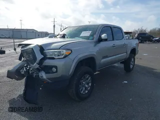 2018 Toyota Tacoma SR5 with VIN 5TFAZ5CN6JX057889, listed as a IAAI auction lot 41449604 with 114,888 mi miles and . Bid and sale history available at DreamBid. Image 17.