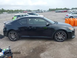 2014 Scion tC z VIN JTKJF5C76E3078256, wystawiony jako IAAI lot #42437930 z przebiegiem 239 399 mil mil oraz . Historia ofert i sprzedaży dostępna na DreamBid. Obrazek 13.