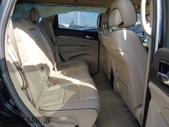 2019 Jeep Grand Cherokee Overland with VIN 1C4RJFCGXKC688543, listed as a IAAI auction lot 41643678 with 65,182 mi miles. Bid and sale history available at carsss.com. Image 8.