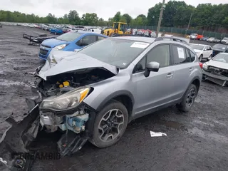2016 Subaru Crosstrek Premium z VIN JF2GPADC8G8255027, wystawiony jako IAAI lot #42506891 z przebiegiem 83 488 mil mil oraz . Historia ofert i sprzedaży dostępna na DreamBid. Obrazek 2.