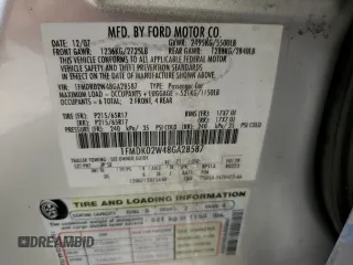 2008 Ford Taurus X SEL с VIN 1FMDK02W48GA28587, выставлен на аукционе Copart как лот 72361434 с пробегом 144 694 миль миль и На запчасти • Non repairable. История ставок и продаж доступна на DreamBid. Изображение 14.