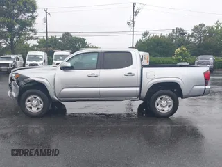 2023 Toyota Tacoma SR with VIN 3TYAX5GN0PT071080, listed as a IAAI auction lot 42426897 with 58,017 mi miles and . Bid and sale history available at DreamBid. Image 14.