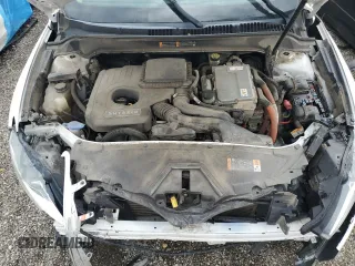 2014 Lincoln MKZ Hybrid z VIN 3LN6L2LU2ER816576, wystawiony jako Copart lot #57030235 z przebiegiem 221 863 mil mil oraz Szkoda całkowita • Salvage title. Historia ofert i sprzedaży dostępna na DreamBid. Obrazek 11.