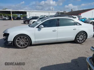 2015 Audi A8 L 4.0T with VIN WAU32AFD4FN002639, listed as a IAAI auction lot 41703951 with 103,722 mi miles. Bid and sale history available at carsss.com. Image 15.