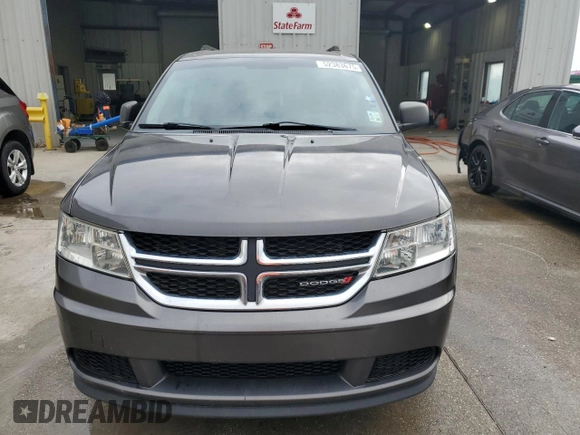 2016 Dodge Journey American Value with VIN 3C4PDCAB8GT138354, listed as a Copart auction lot 52383675 with 142,174 mi miles and Salvage Title. Bid and sale history available at DreamBid. Image 5.