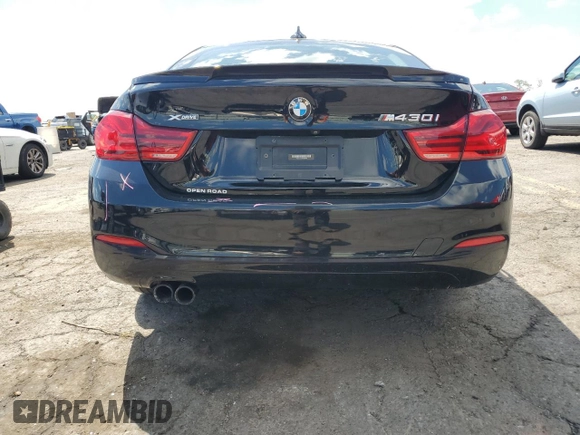 2019 BMW 4 Series 430i xDrive z VIN WBA4J3C50KBL10578, wystawiony jako Copart lot #55742005 z przebiegiem 69 543 mil mil oraz Szkoda całkowita • Salvage title. Historia ofert i sprzedaży dostępna na DreamBid. Obrazek 6.
