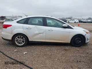 2018 Ford Focus SE z VIN 1FADP3F23JL225333, wystawiony jako IAAI lot #41758445 z przebiegiem 133 307 mil mil oraz . Historia ofert i sprzedaży dostępna na DreamBid. Obrazek 13.