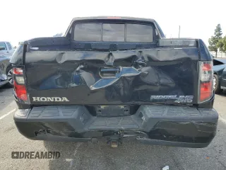 2014 Honda Ridgeline Sport with VIN 5FPYK1F7XEB008758, listed as a Copart auction lot 51022445 with 197,006 mi miles and Salvage title. Bid and sale history available at DreamBid. Image 6.