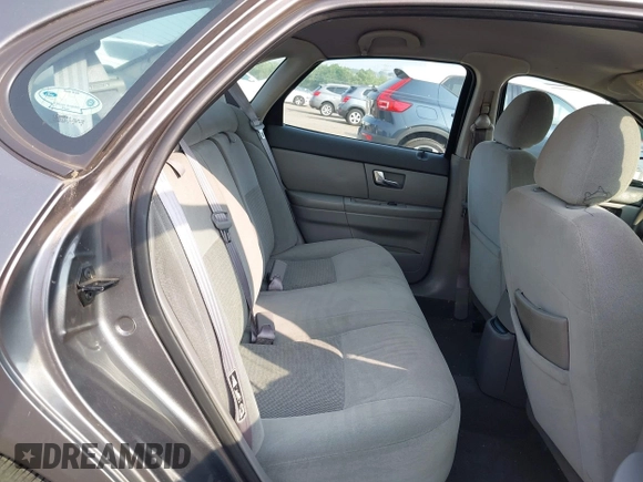 2003 Ford Taurus SE Standard with VIN 1FAFP53203G173180, listed as a IAAI auction lot 42495369 with 129,091 mi miles and . Bid and sale history available at DreamBid. Image 8.