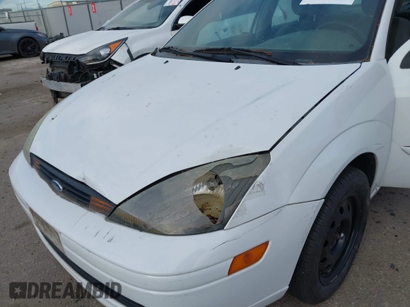 2004 Ford Focus SE with VIN 1FAFP34394W199845, listed as a IAAI auction lot 41896239 with 98,464 mi miles and . Bid and sale history available at DreamBid. Image 6.