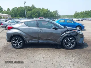 2018 Toyota C-HR XLE with VIN NMTKHMBX0JR008776, listed as a IAAI auction lot 42472338 with 48,910 mi miles and . Bid and sale history available at DreamBid. Image 13.