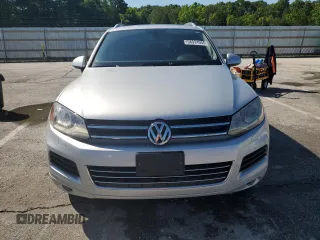 2014 Volkswagen Touareg Lux with VIN WVGEF9BP1ED012267, listed as a Copart auction lot 58924055 with 81,009 mi miles and Salvage title. Bid and sale history available at DreamBid. Image 5.