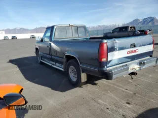 1990 GMC Sierra 1500 with VIN 1GTFC24K2LE554012, listed as a Copart auction lot 86004084 with 174,771 mi miles and Clean Title. Bid and sale history available at DreamBid. Image 2.