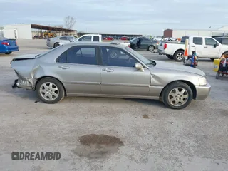 2002 Acura RL z VIN JH4KA96552C008589, wystawiony jako IAAI lot #41860930 z przebiegiem 210 847 mil mil oraz . Historia ofert i sprzedaży dostępna na DreamBid. Obrazek 14.