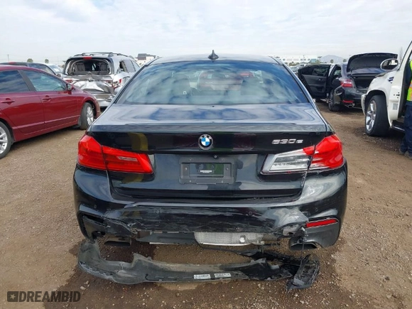 2019 BMW 5 Series 530e iPerformance with VIN WBAJA9C59KB389304, listed as a IAAI auction lot 41562928 with 64,137 mi miles. Bid and sale history available at carsss.com. Image 16.