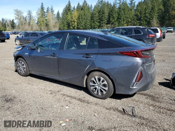 2021 Toyota Prius LE with VIN JTDKAMFP7M3185847, listed as a Copart auction lot 52897465 with 58,996 mi miles and Salvage Title. Bid and sale history available at DreamBid. Image 2.