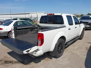2021 Nissan Frontier SV z VIN 1N6ED0EA4MN704865, wystawiony jako IAAI lot #41990731 z przebiegiem 13 329 mil mil oraz . Historia ofert i sprzedaży dostępna na DreamBid. Obrazek 4.