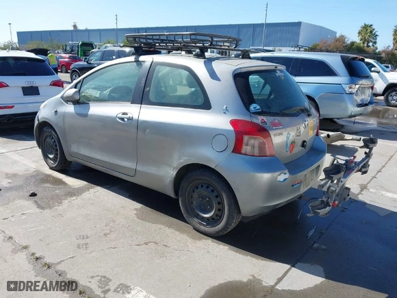 2007 Toyota Yaris with VIN JTDJT923175050104, listed as a IAAI auction lot 41818704 with 467,292 mi miles. Bid and sale history available at carsss.com. Image 3.